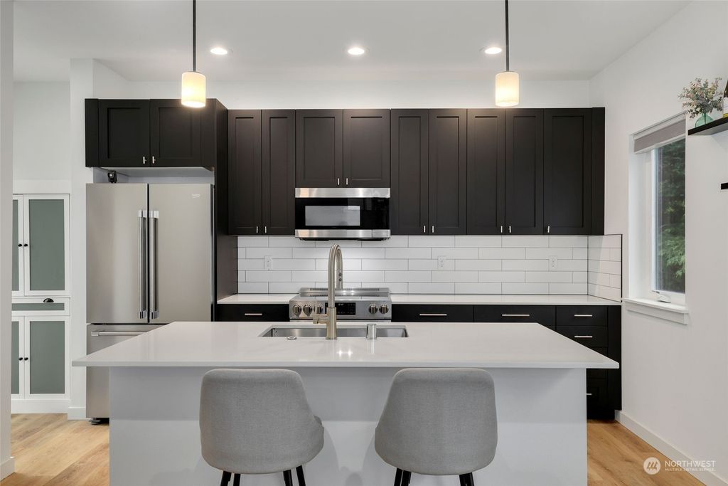 Photo of 9302 Sturtevant Avenue S, Seattle, WA 98118 (MLS # 2221614)