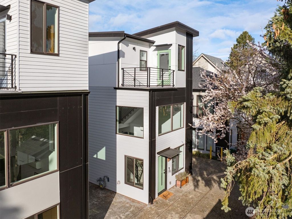 Photo of 8668 13th Avenue NW, Seattle, WA 98117 (MLS # 2344916)