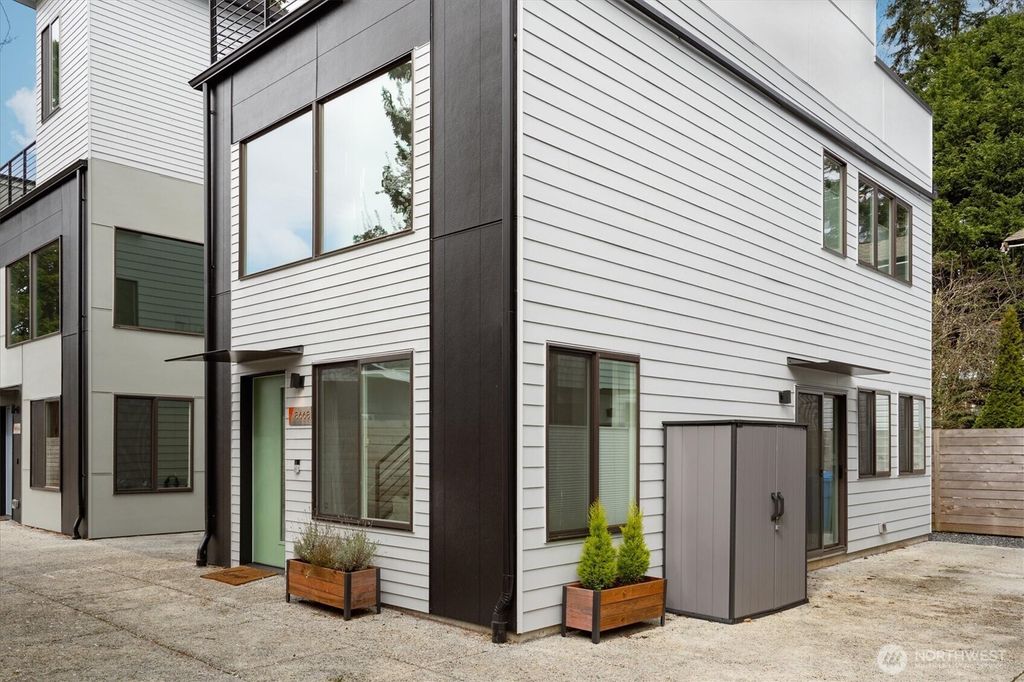 Photo of 8668 13th Avenue NW, Seattle, WA 98117 (MLS # 2344916)