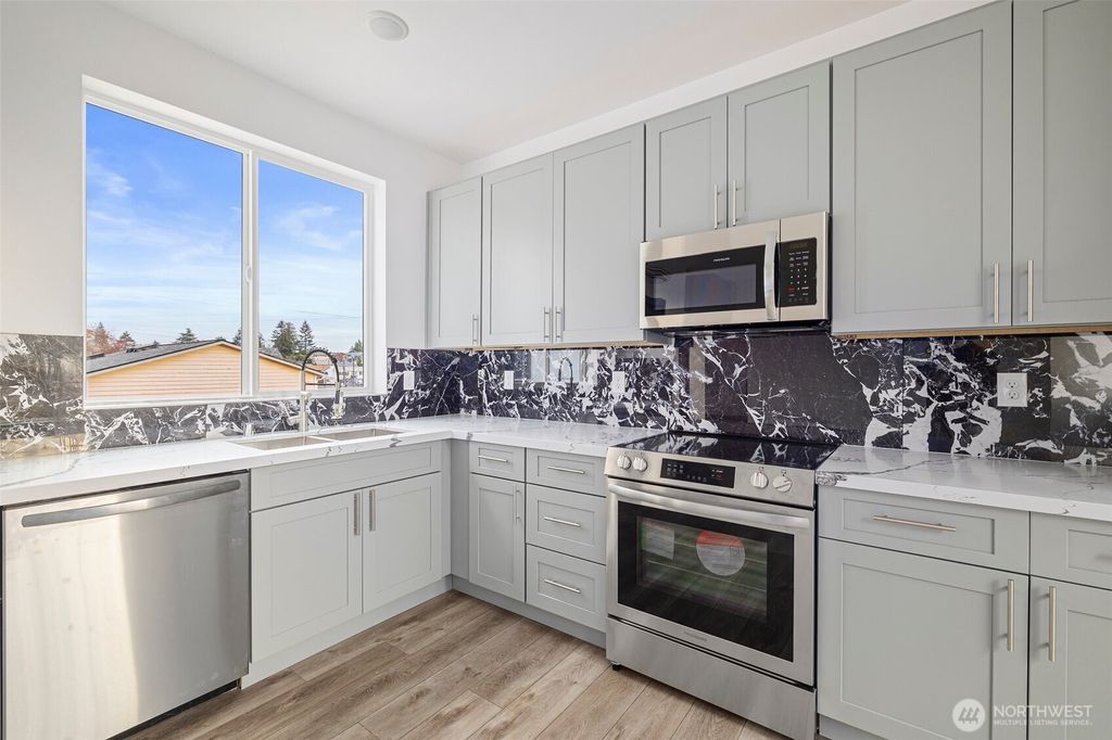 Photo of 9747 57th Avenue S #B, Seattle, WA 98118 (MLS # 2451452)