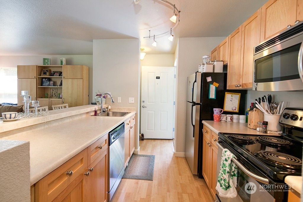 Photo of 9805 Avondale Road NE #R-250, Redmond, WA 98052 (MLS # 2141468)