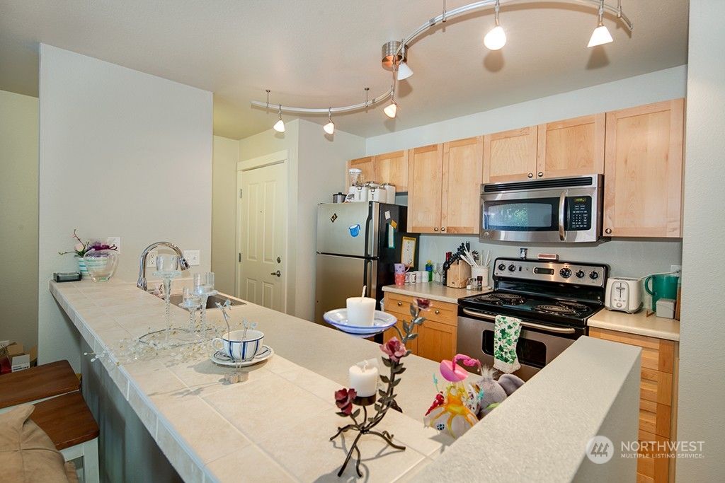 Photo of 9805 Avondale Road NE #R-250, Redmond, WA 98052 (MLS # 2141468)