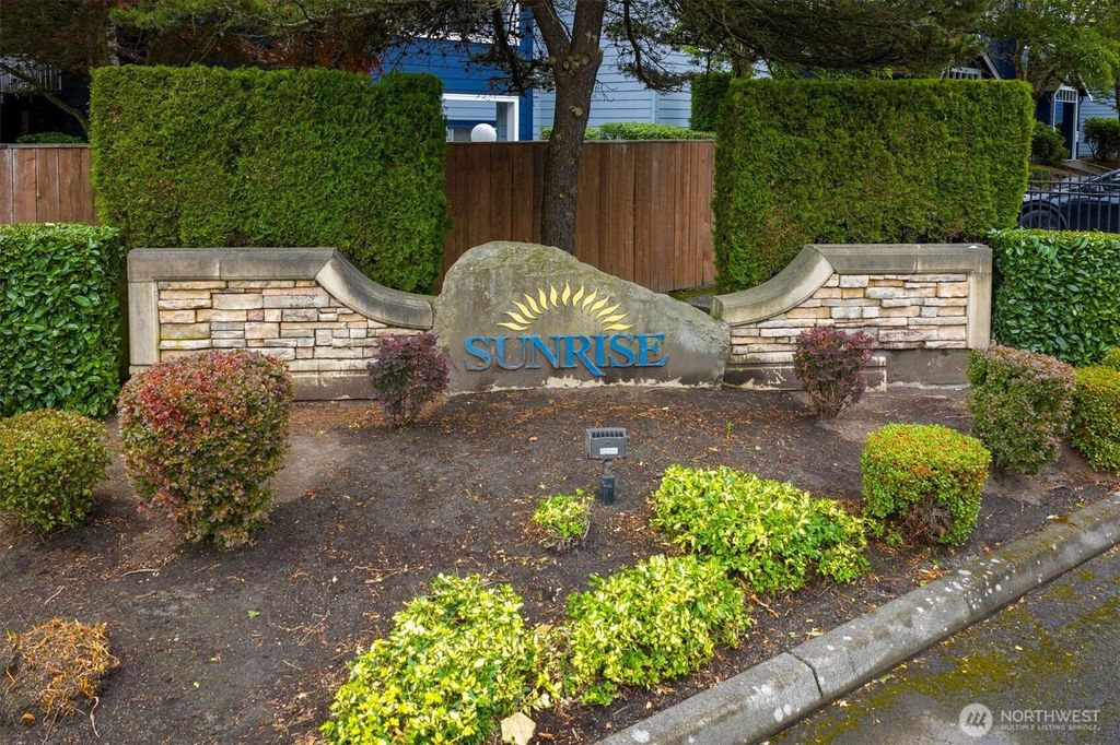 Photo of 10825 SE 200th Street #D-103, Kent, WA 98031 (MLS # 2404001)