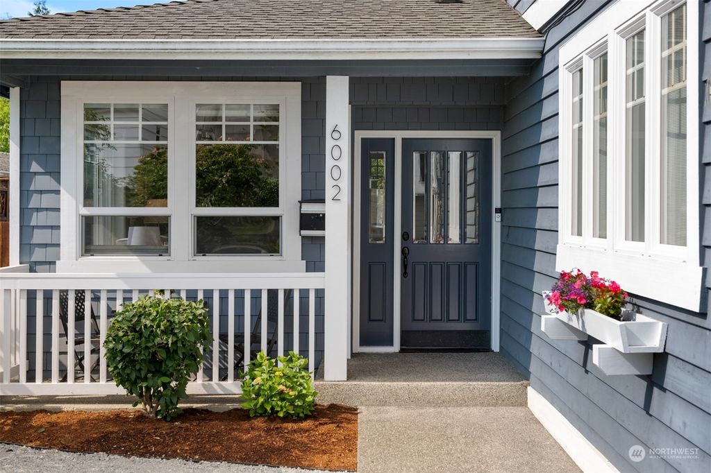 Photo of 6002 SW Orleans Street, Seattle, WA 98116 (MLS # 2129947)