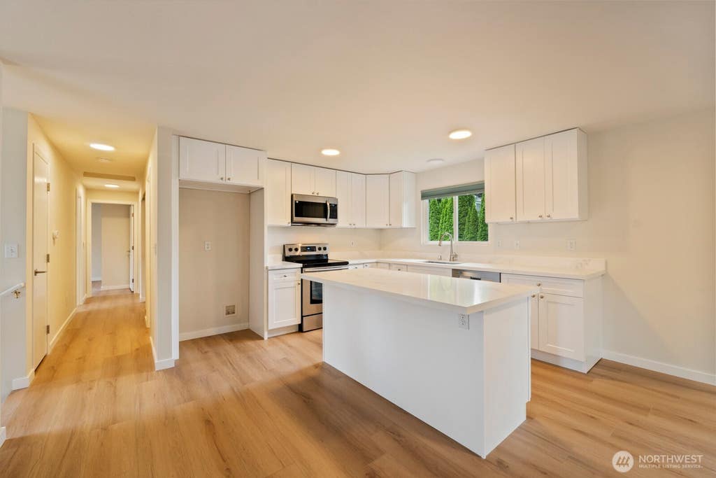 Photo of 12057 20th Avenue NE, Seattle, WA 98125 (MLS # 2547885)