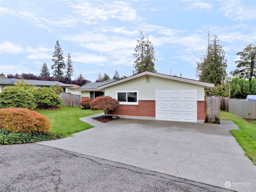 Photo of 5203 NE 3rd Street, Renton, WA 98059 (MLS # 2171200)