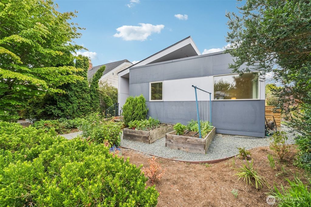 Photo of 8351 Jones Avenue NW, Seattle, WA 98117 (MLS # 2416083)