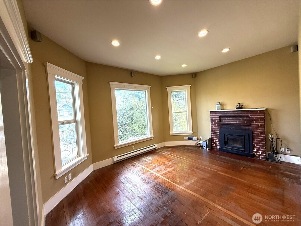 Photo of 919 Martin Luther King Jr Way WAY, Seattle, WA 98122 (MLS # 2588146)