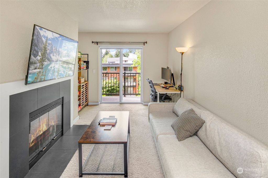 Photo of 840 NE 125th Street #405, Seattle, WA 98125 (MLS # 2138219)