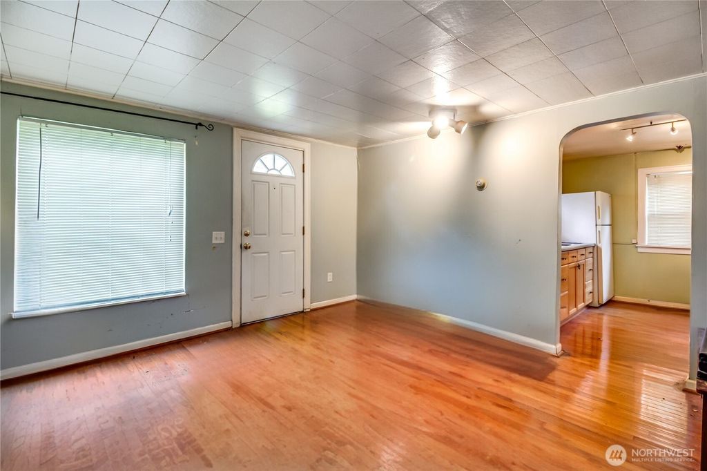 Photo of 9817 35th Avenue SW, Seattle, WA 98126 (MLS # 2422241)