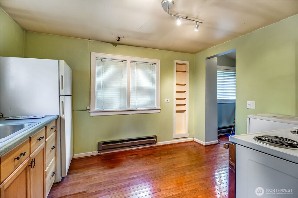 Photo of 9817 35th Avenue SW, Seattle, WA 98126 (MLS # 2422241)