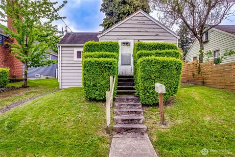 Photo of 9817 35th Avenue SW, Seattle, WA 98126 (MLS # 2422241)