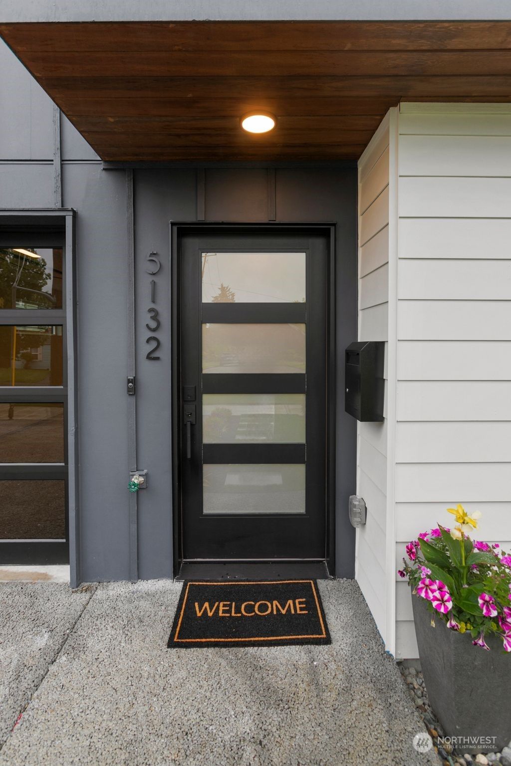 Photo of 5132 48th Avenue S, Seattle, WA 98118 (MLS # 2242601)