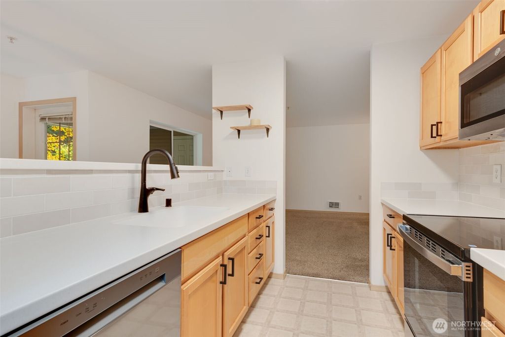 Photo of 805 Harrington Place SE #3143, Renton, WA 98058 (MLS # 2451688)