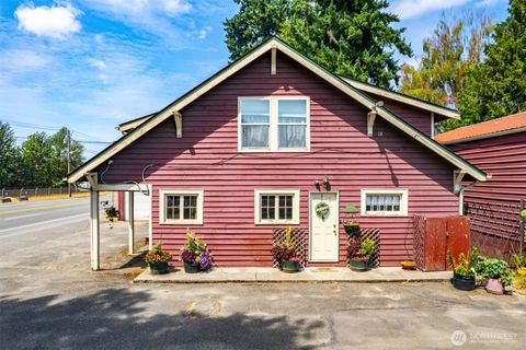 Photo of 1109 Valley Avenue NW, Puyallup, WA 98371 (MLS # 2417768)