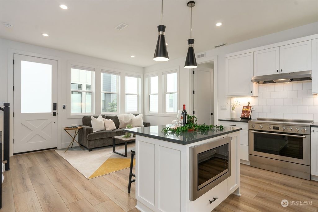 Photo of 4131 40th Avenue SW #C, Seattle, WA 98116 (MLS # 2328096)