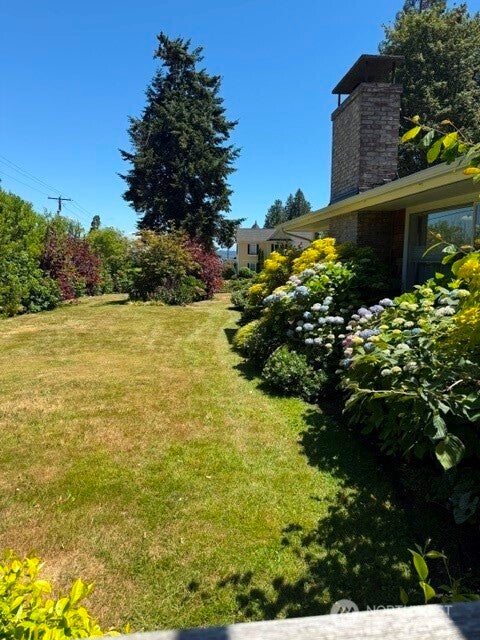 Photo of 10779 NE Valley Road, Bainbridge Island, WA 98110 (MLS # 2542837)
