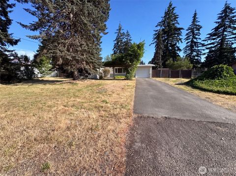 Photo of 712 141st Street E, Tacoma, WA 98445 (MLS # 2560024)