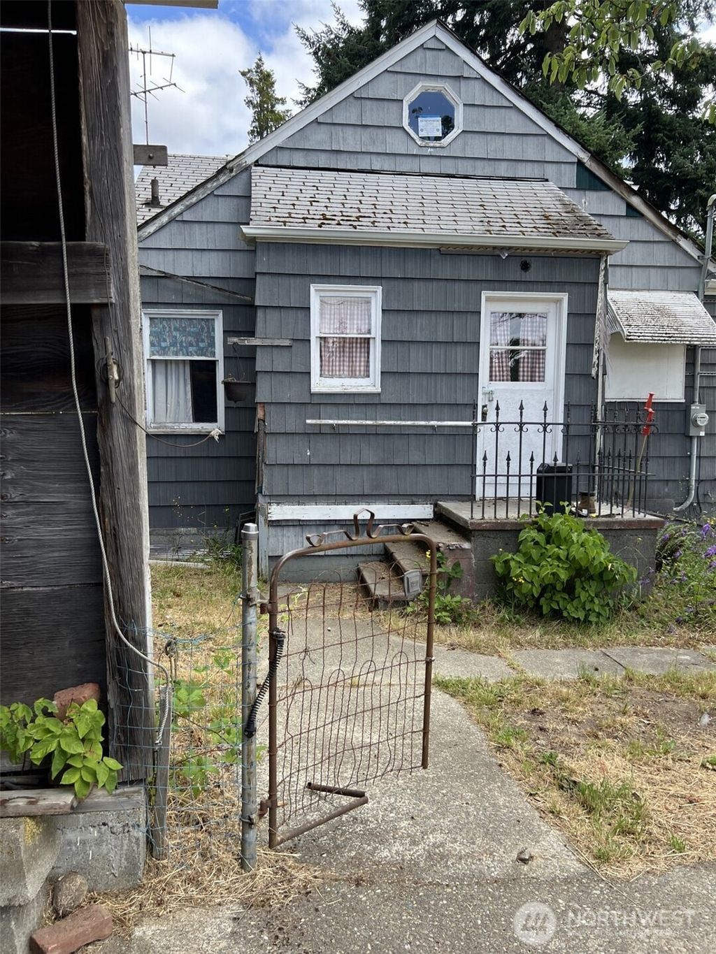 Photo of 8145 30th Avenue SW, Seattle, WA 98126 (MLS # 2398806)