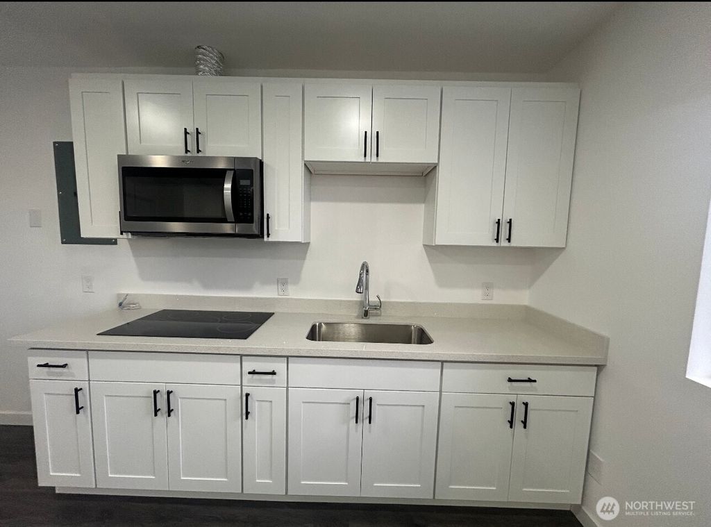 Photo of 7662 S 134th Street, Seattle, WA 98178 (MLS # 2402510)