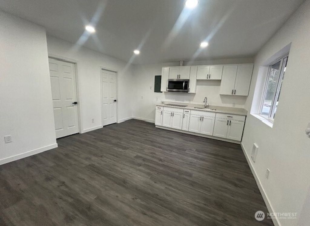 Photo of 7662 S 134th Street, Seattle, WA 98178 (MLS # 2402510)
