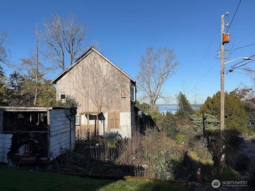Photo of 5221 S Ferdinand Street, Seattle, WA 98118 (MLS # 2512988)
