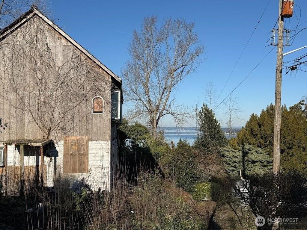 Photo of 5221 S Ferdinand Street, Seattle, WA 98118 (MLS # 2512988)
