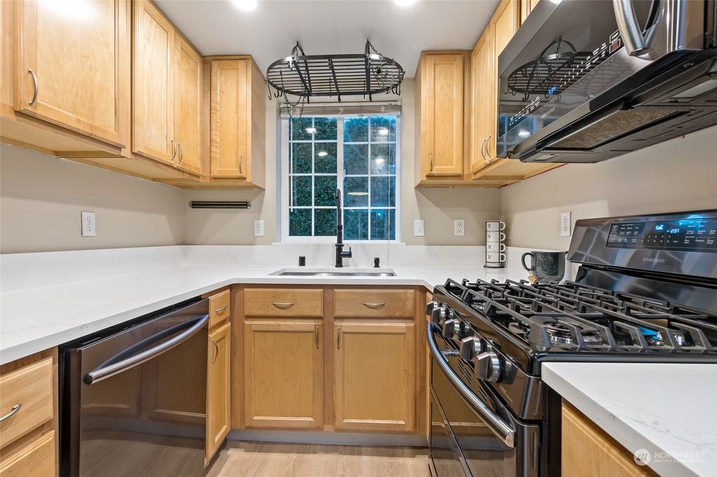 Photo of 10418 17th Avenue SW, Seattle, WA 98146 (MLS # 2187467)