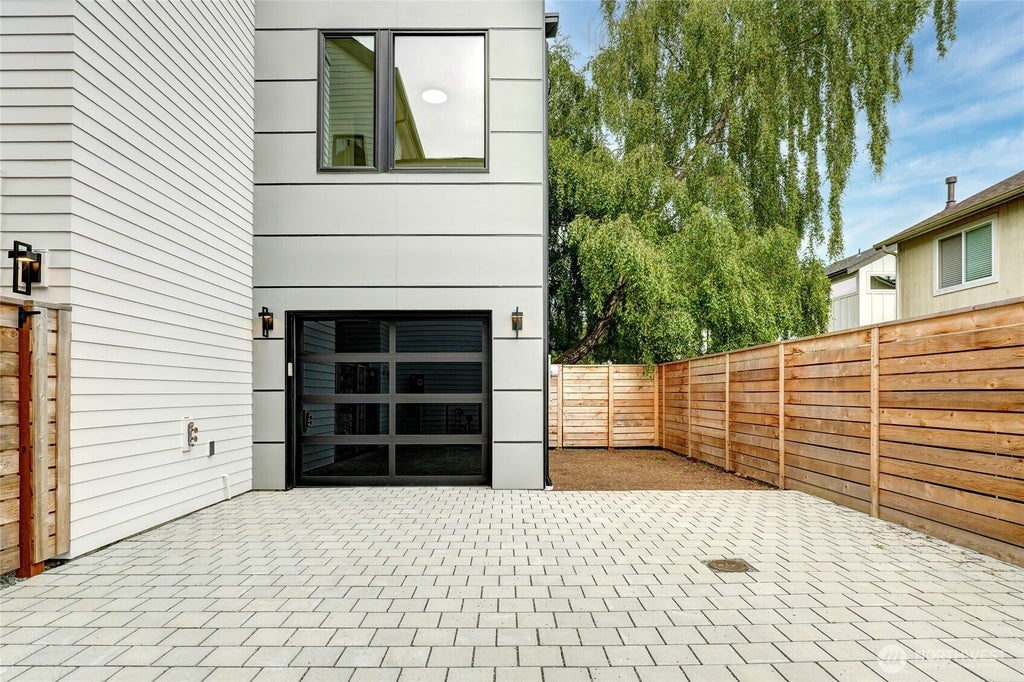 Photo of 8750 13th Avenue NW #C, Seattle, WA 98117 (MLS # 2589794)