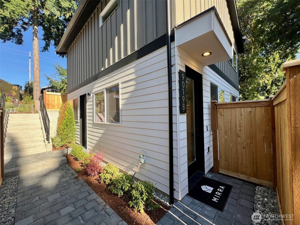 Photo of 9019 Dibble Avenue NW #B, Seattle, WA 98117 (MLS # 2408431)