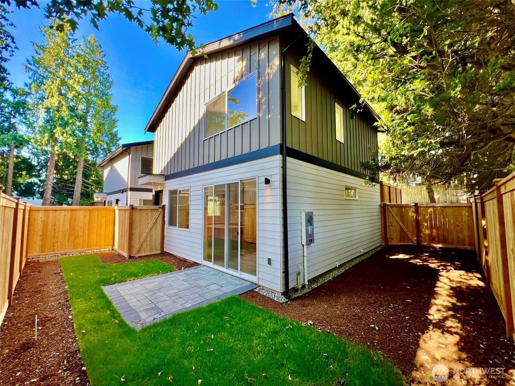 Photo of 9019 Dibble Avenue NW #B, Seattle, WA 98117 (MLS # 2408431)