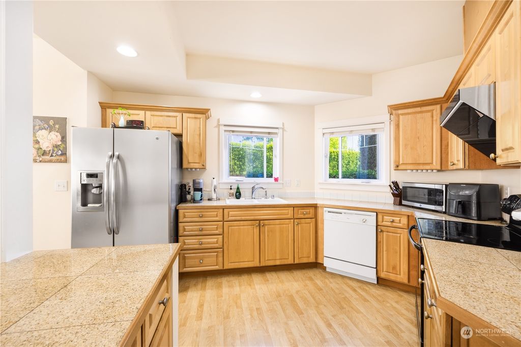 Photo of 10700 SE 260th ST St #G104, Kent, WA 98030 (MLS # 2238639)