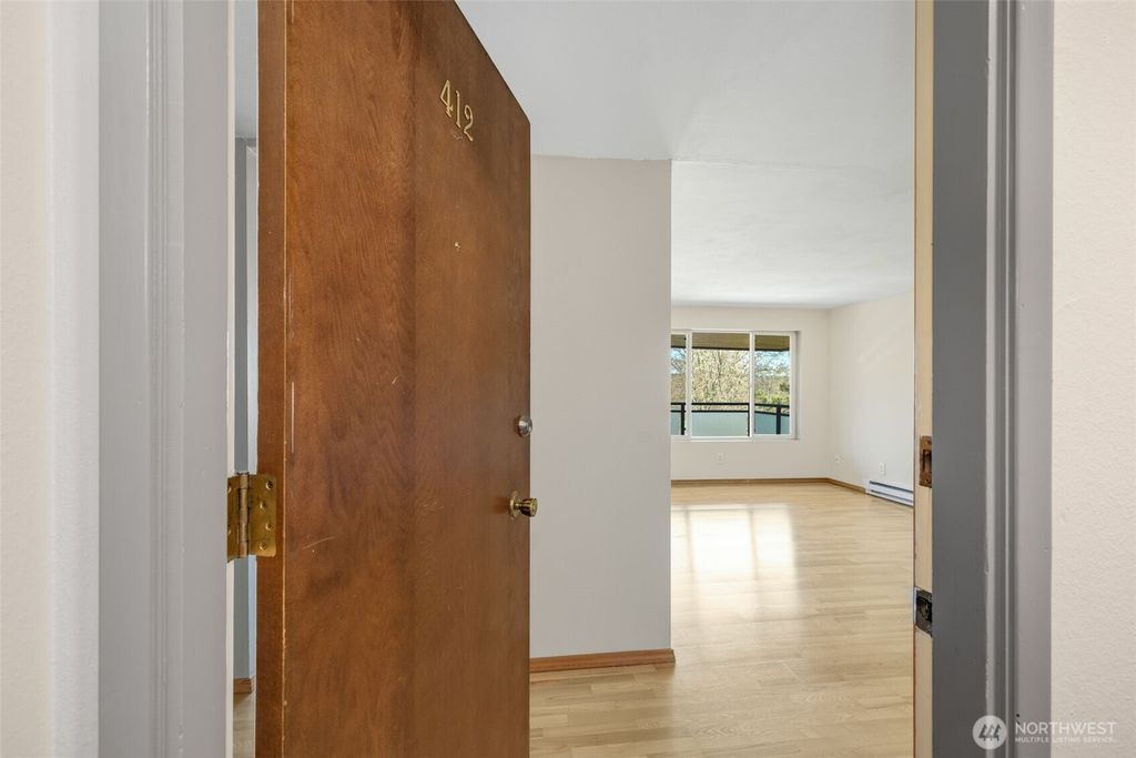 Photo of 7001 Sand Point Way NE #A412, Seattle, WA 98115 (MLS # 2505357)