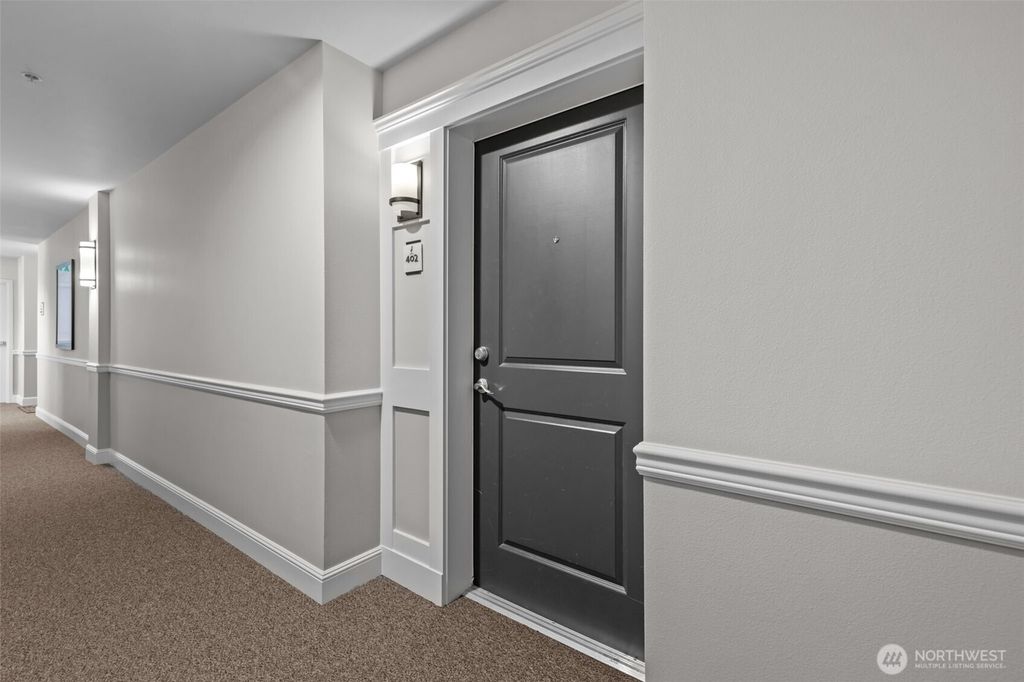 Photo of 3150 W Government Way #402, Seattle, WA 98199 (MLS # 2333775)