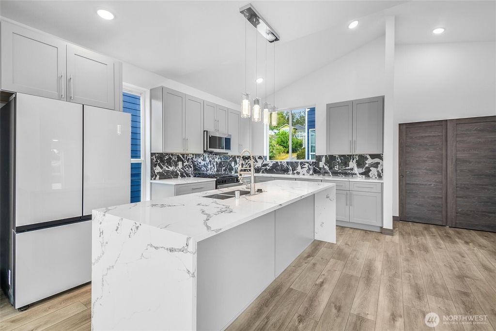 Photo of 8610 42nd Avenue S, Seattle, WA 98118 (MLS # 2477363)