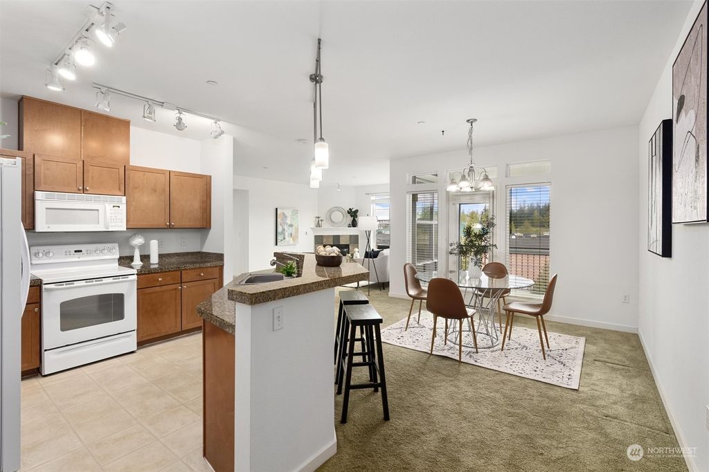 Photo of 7104 265th Street NW #402, Stanwood, WA 98292 (MLS # 2222532)