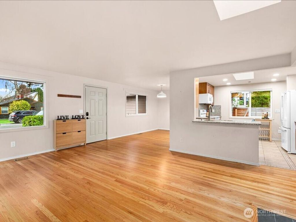 Photo of 8706 13th Avenue NW, Seattle, WA 98117 (MLS # 2463055)