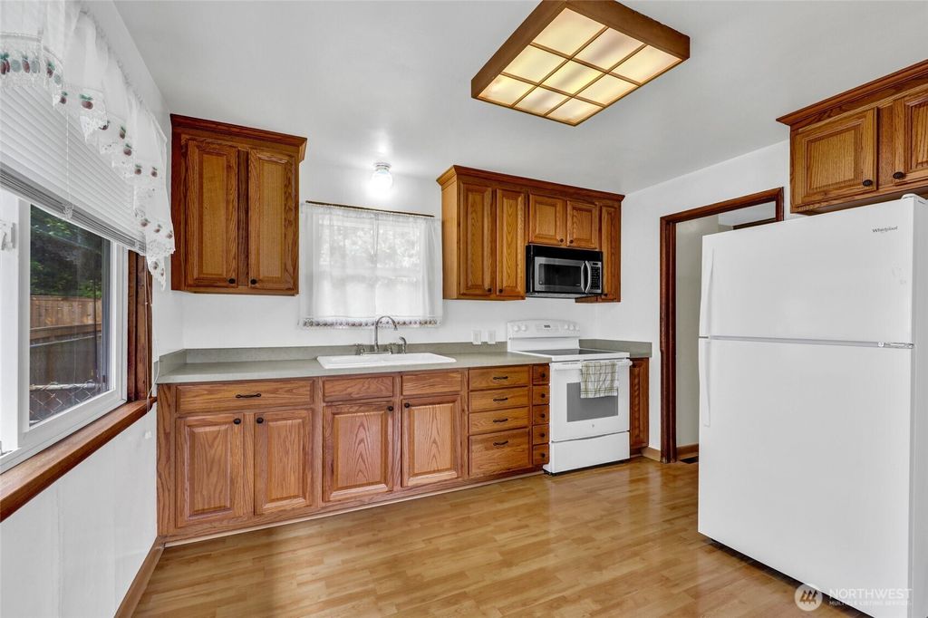 Photo of 4723 50th Avenue SW, Seattle, WA 98116 (MLS # 2393758)