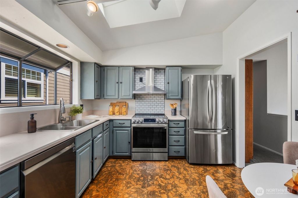 Photo of 2919 W Mansell, Seattle, WA 98199 (MLS # 2412161)