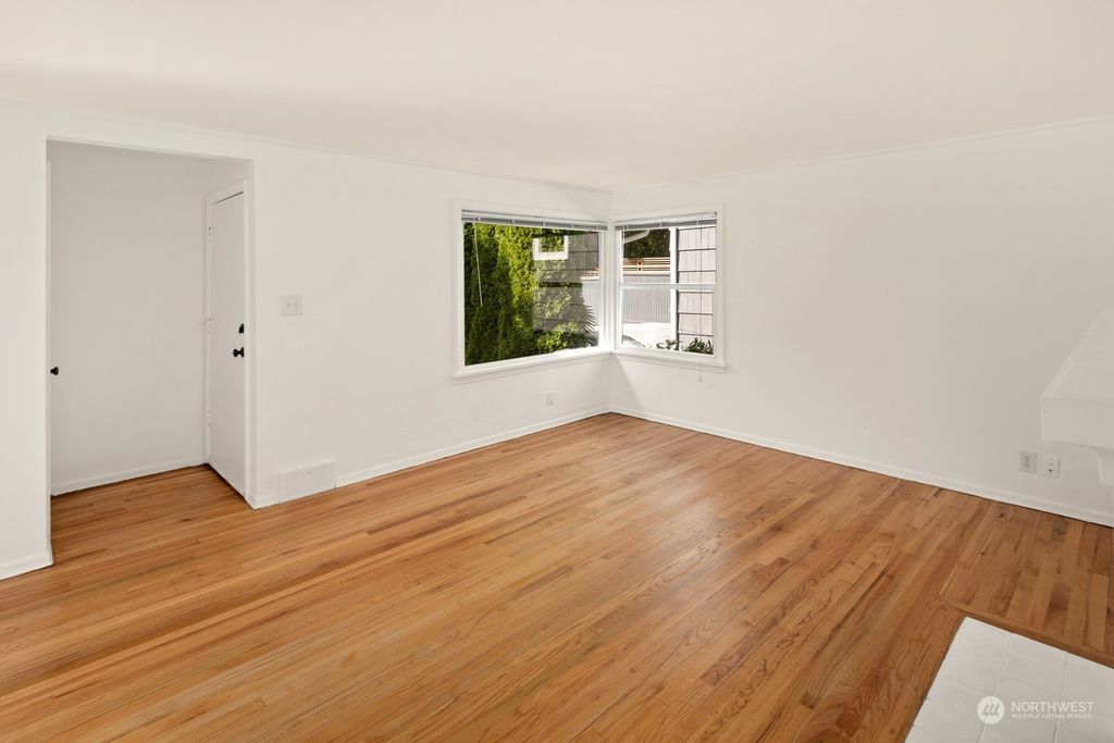 Photo of 8300 35th Avenue SW, Seattle, WA 98126 (MLS # 2298470)