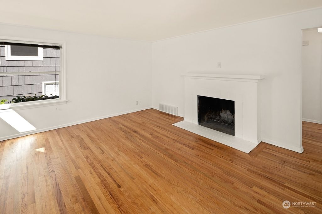 Photo of 8300 35th Avenue SW, Seattle, WA 98126 (MLS # 2298470)
