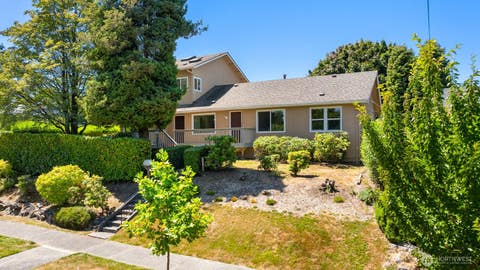 Photo of 8815 18th Avenue SW, Seattle, WA 98106 (MLS # 2564776)