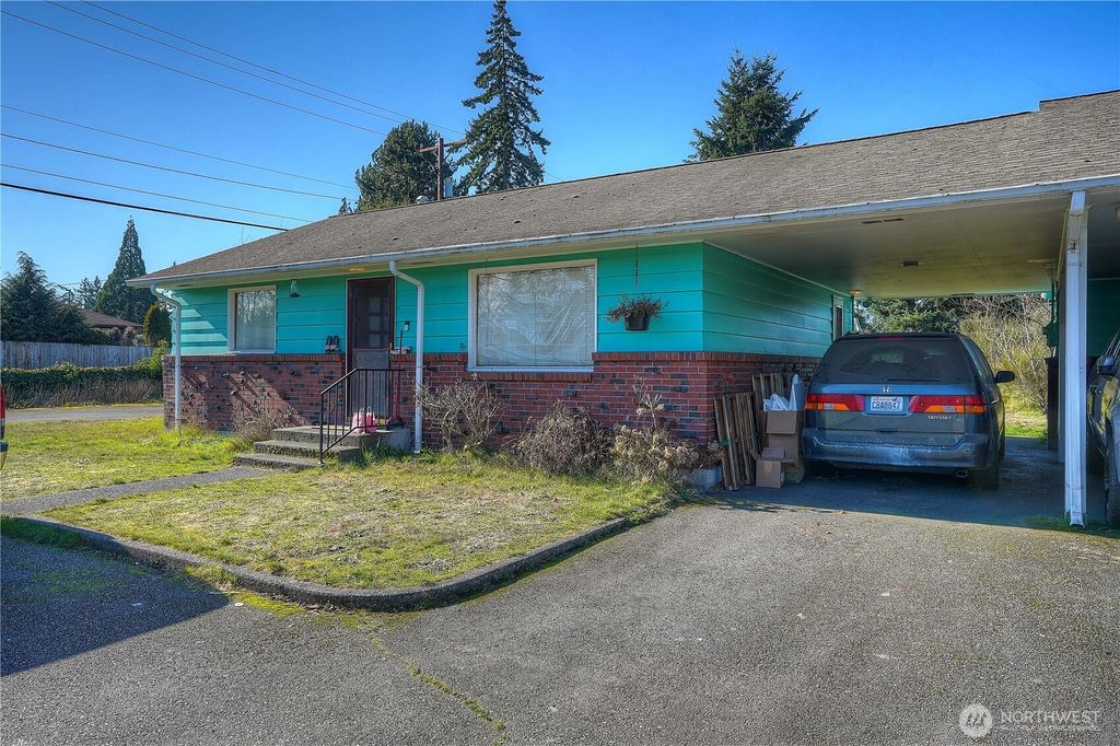 Photo of 305 138th Street E, Tacoma, WA 98445 (MLS # 2480190)