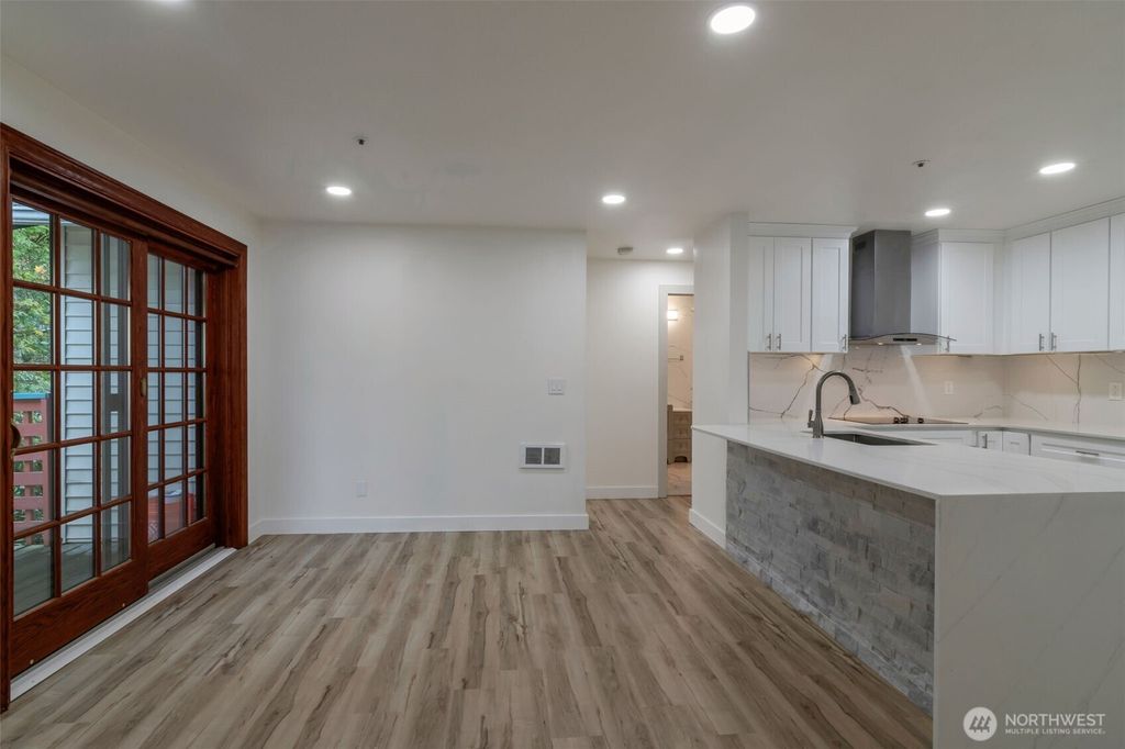 Photo of 6835 NE 153rd Place #C201, Kenmore, WA 98028 (MLS # 2440511)