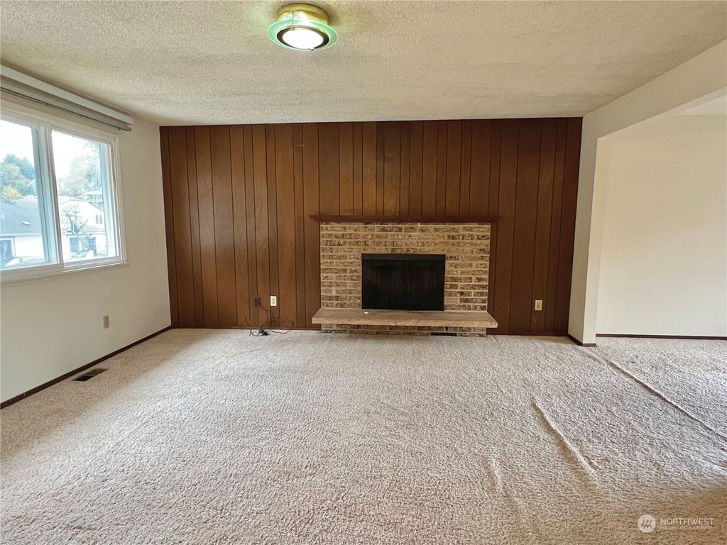 Photo of 12230 10th Avenue S, Seattle, WA 98168 (MLS # 2040315)