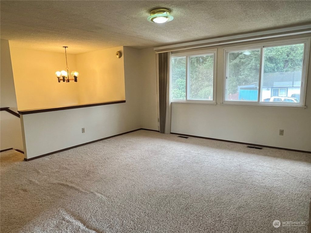 Photo of 12230 10th Avenue S, Seattle, WA 98168 (MLS # 2040315)