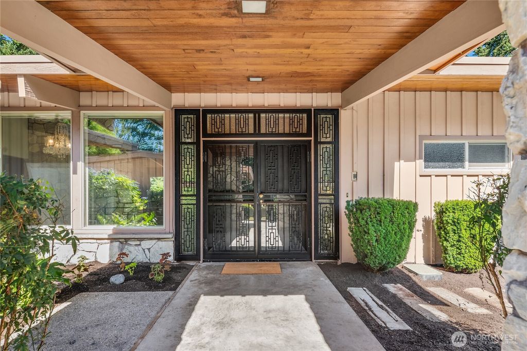 Photo of 10704 Country Club Lane S, Burien, WA 98168 (MLS # 2409198)