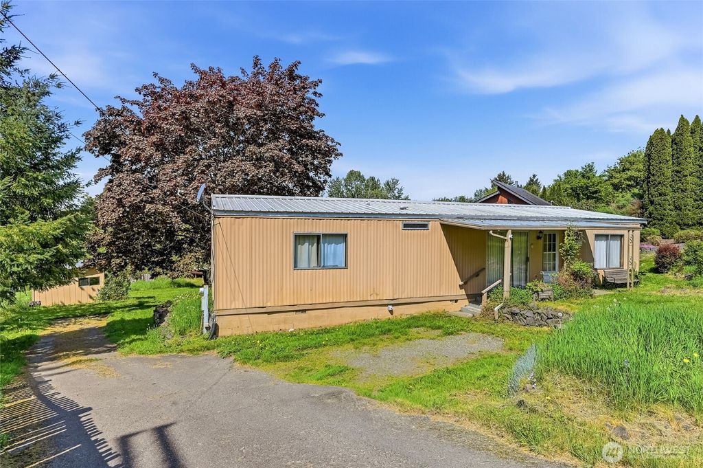Photo of 32711 Commission Avenue, Black Diamond, WA 98010 (MLS # 2516317)