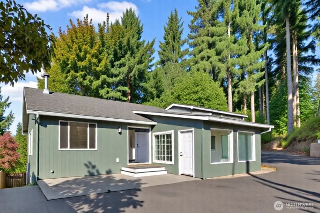 Photo of 5502 NE 10th Street, Renton, WA 98059 (MLS # 2434507)