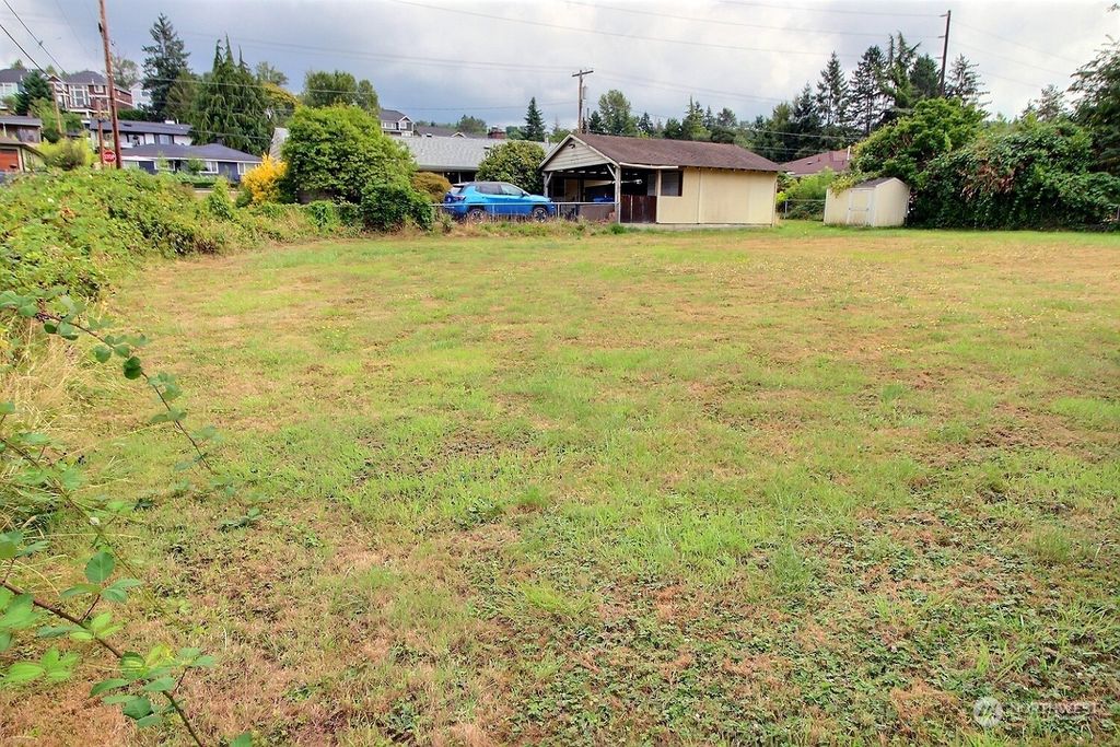 Photo of 3619 Talbot Road S, Renton, WA 98055 (MLS # 2146446)